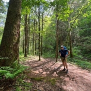 Mark Neese, owner of True North Counseling, standing in Jefferson Memorial Forest on a hike.