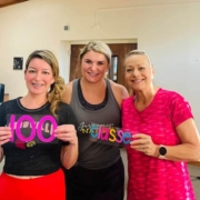Mark Neese's wife of True North Counseling celebrating attending her 100th jazzercise class.