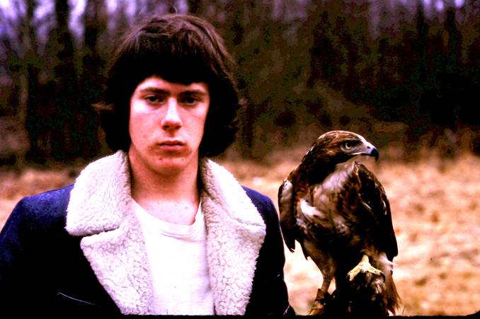 Young Mark Neese in high school posing with a hawk from when he was involved in Falconry.
