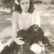 Vintage photo of Mark Neese's mother and her dog. True North Counseling.