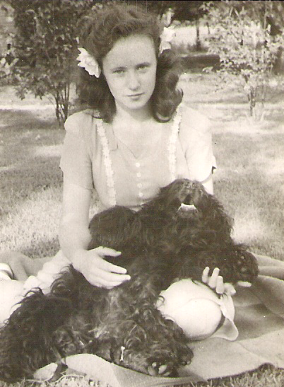Vintage photo of Mark Neese's mother and her dog. True North Counseling.